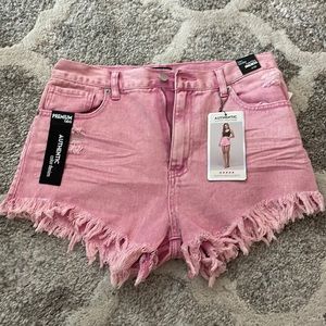Pink frayed shorts